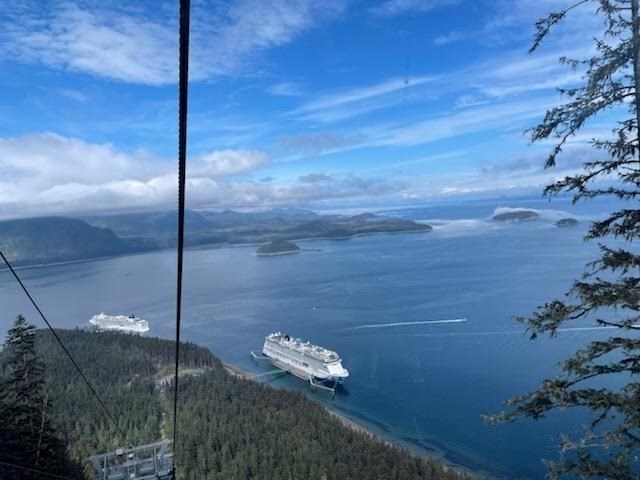 Top of the zipline looking down at Norwegian Bliss