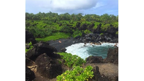 Gorgeous black sand beaches from the volcanoes.