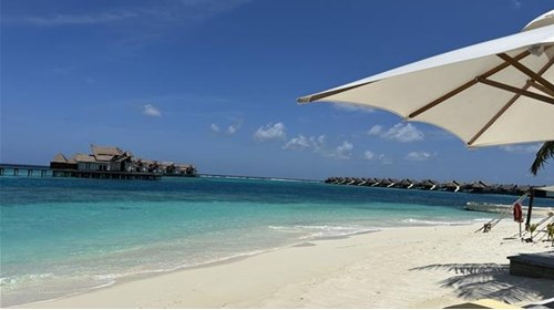 Maldives beach with view of bungalows