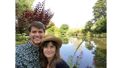 My wife and I standing at the garden