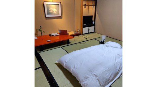 Tatami flooring, futon, zataku table