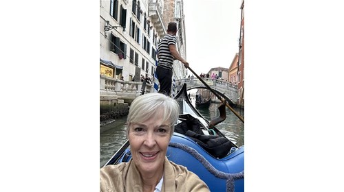 Enjoying a Gondola ride in Venice