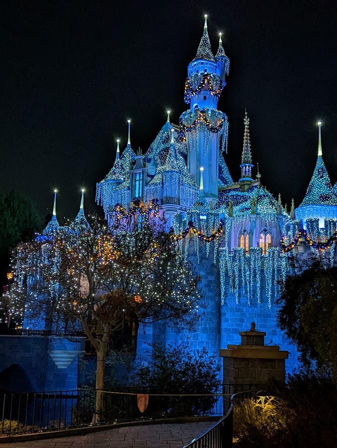 Sleeping Beauty Castle with holiday lights