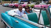 Touring through Havana in a classic automobile.
