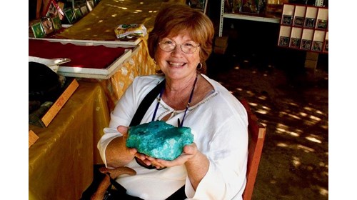 Holding the biggest raw turquoise ever in Peru