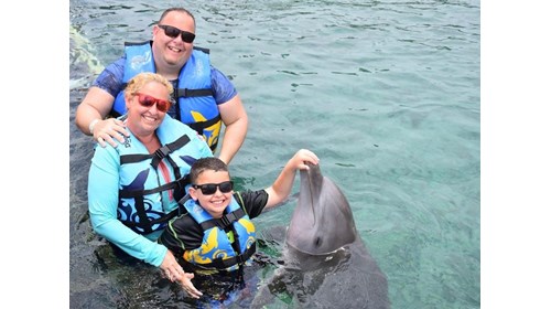 Swimming with our dolphin friend in Cozumel