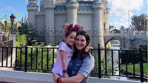My daughter and I in front of Cinderella's Castle 