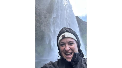 Enjoying a waterfall in Iceland