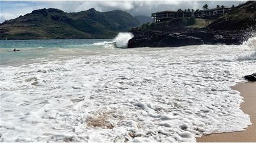 Waves crashing on Ninini Beach below Timbers Kauai