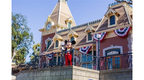 Mickey Mouse greeting kids young & old 