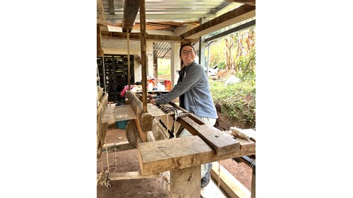 Weaving on my loom during residency.