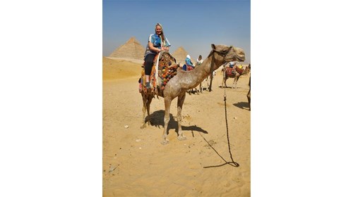 Me on a camel in front of the Pyramids of Giza