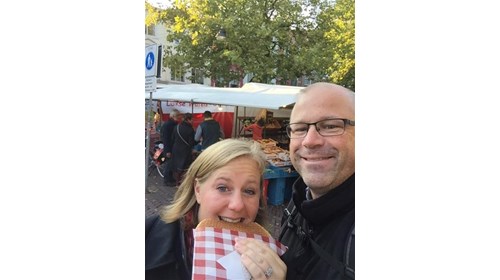 Eating a giant Stroopwafel in Gouda, Netherlands
