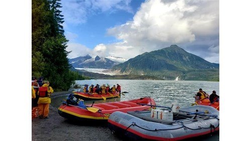 White water rafting on a glacier river in Alaska
