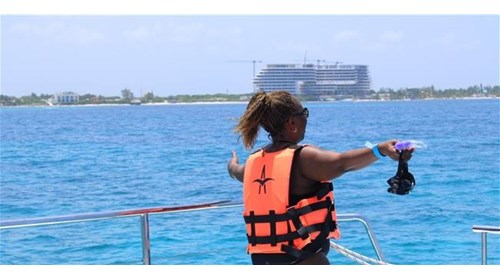 "Snorkeling Cancun’s Crystal-Blue Caribbean Waters