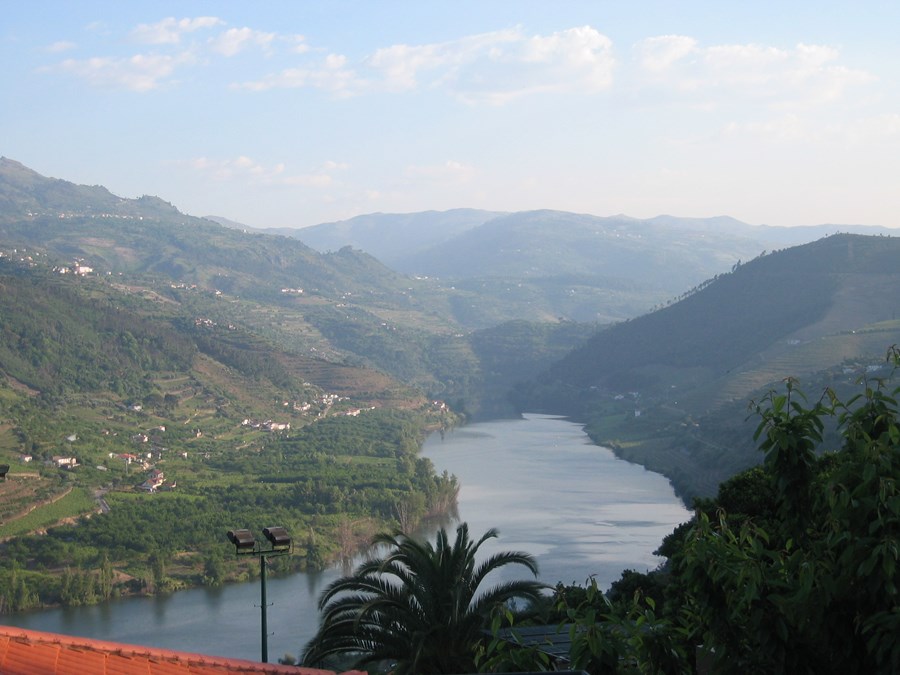 A hotel room with a view of the Douro River