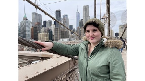 Standing on the Brooklyn Bridge in NYC