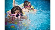 Children Swimming on Family Cruise Vacation
