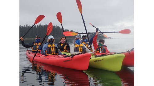 Group kayak with guests wearing masks