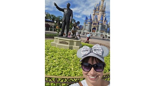 A photo with Walt & Mickey in Magic Kingdom