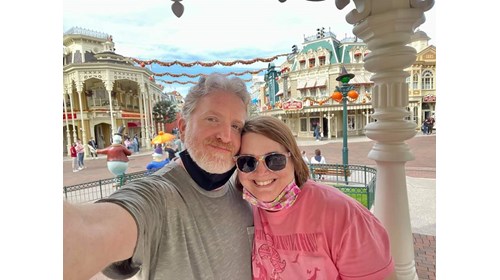 my husband & me with a view of Main Street at DLP