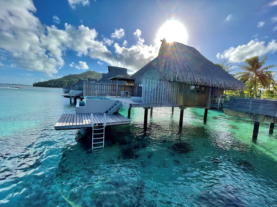 Sunset overwater villa with pool at Conrad Nui