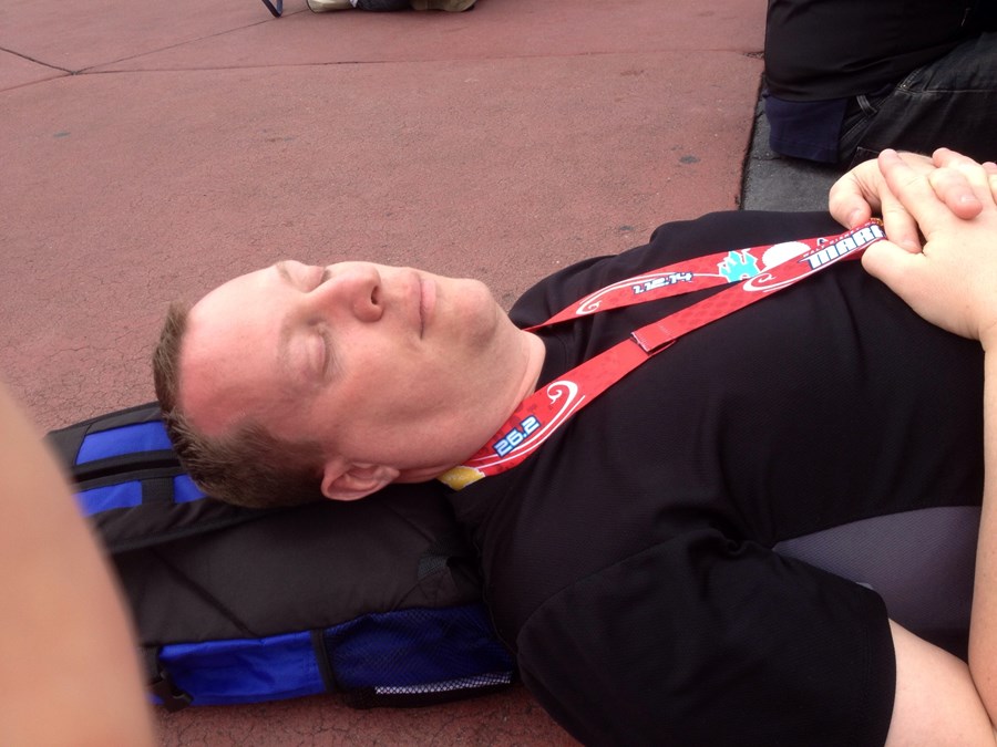 Taking a nap in the middle of Epcot post marathon