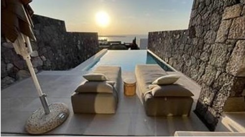 Sunset from our suite in Santorini, Greece