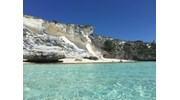 The white cliffs and blue waters of the Exumas.