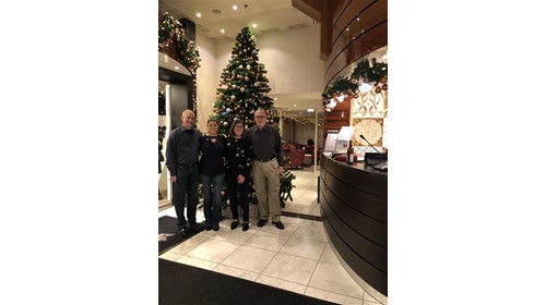 In front of AmaWaterways' tree with family