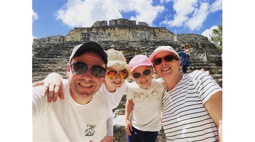 My family at Chacchoban Mayan Ruins in Costa Maya