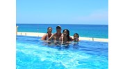 Enjoying the infinity pool at the Riu Palace Cabo