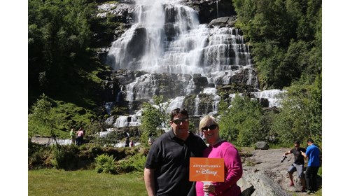 My husband and I at Tvindefossen Waterfall