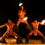 Fire dancers on the beach.