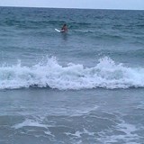 Surfing at Zuma beach
