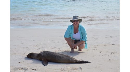 Here I am in Galapagos with a Sea Lion sunning!